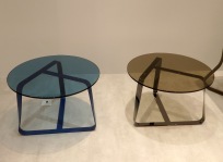 Coffee tables by colored glass at Desalto