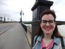 Me happy on the bridge Pont de Pierre